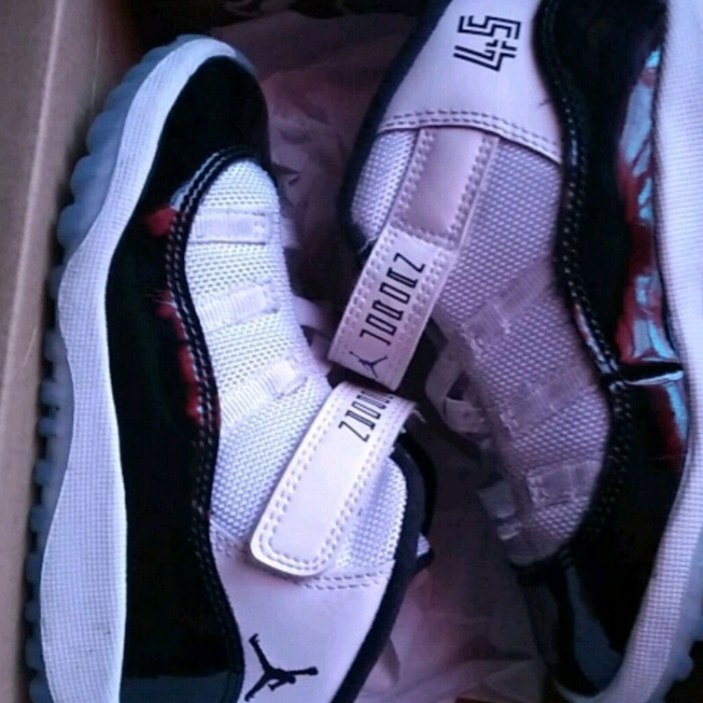 Whit black jordans